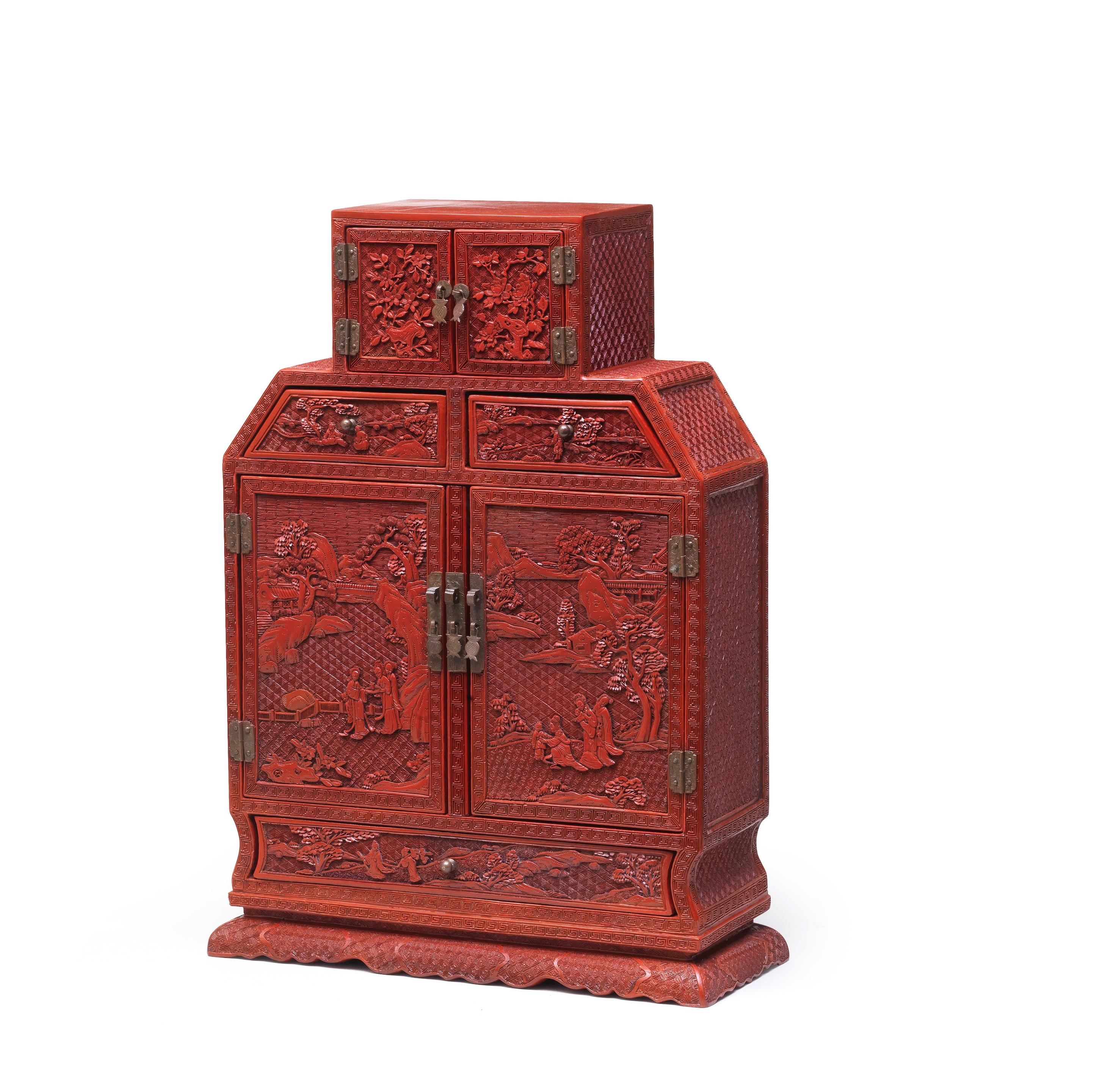 Appraisal: A RARE CARVED CINNABAR LACQUER CABINET Qianlong Jiaqing The rectangular