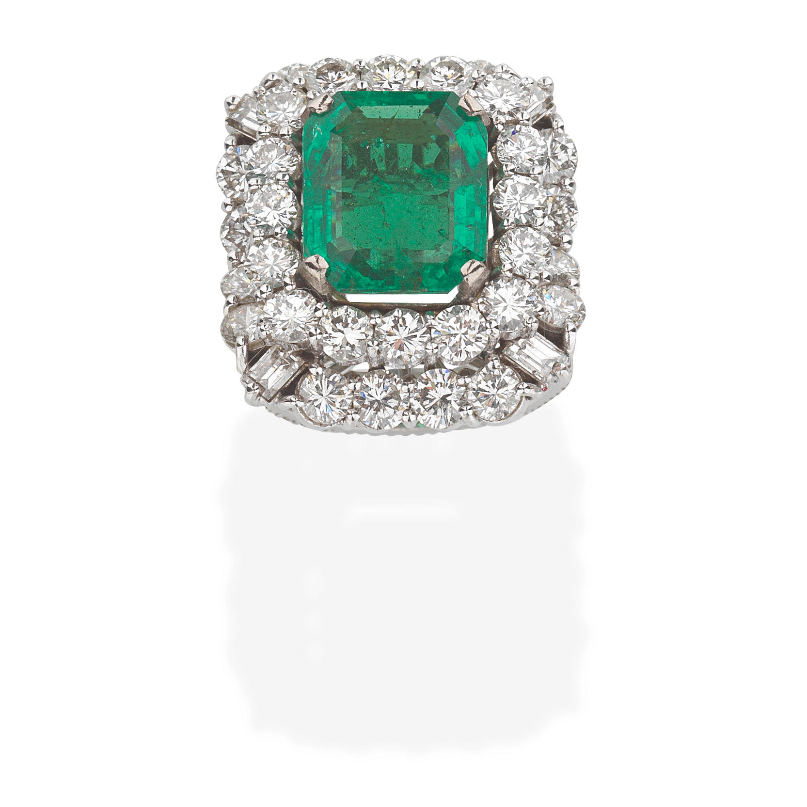 Appraisal: EMERALD AND DIAMOND DRESS RING Step-cut emerald brilliant and baguette-cut