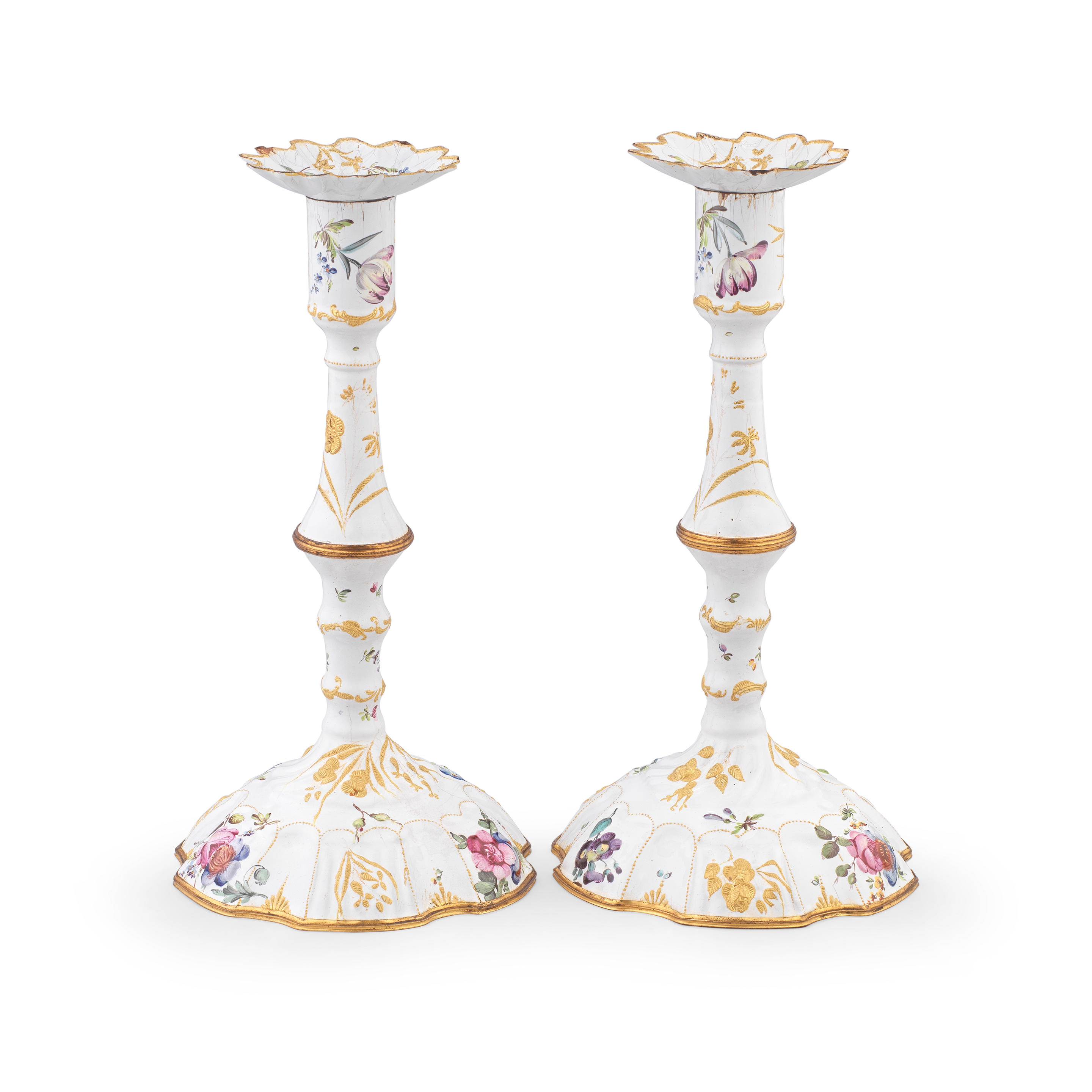 Appraisal: A PAIR OF SOUTH STAFFORDSHIRE ENAMEL CANDLESTICKS CIRCA Made in