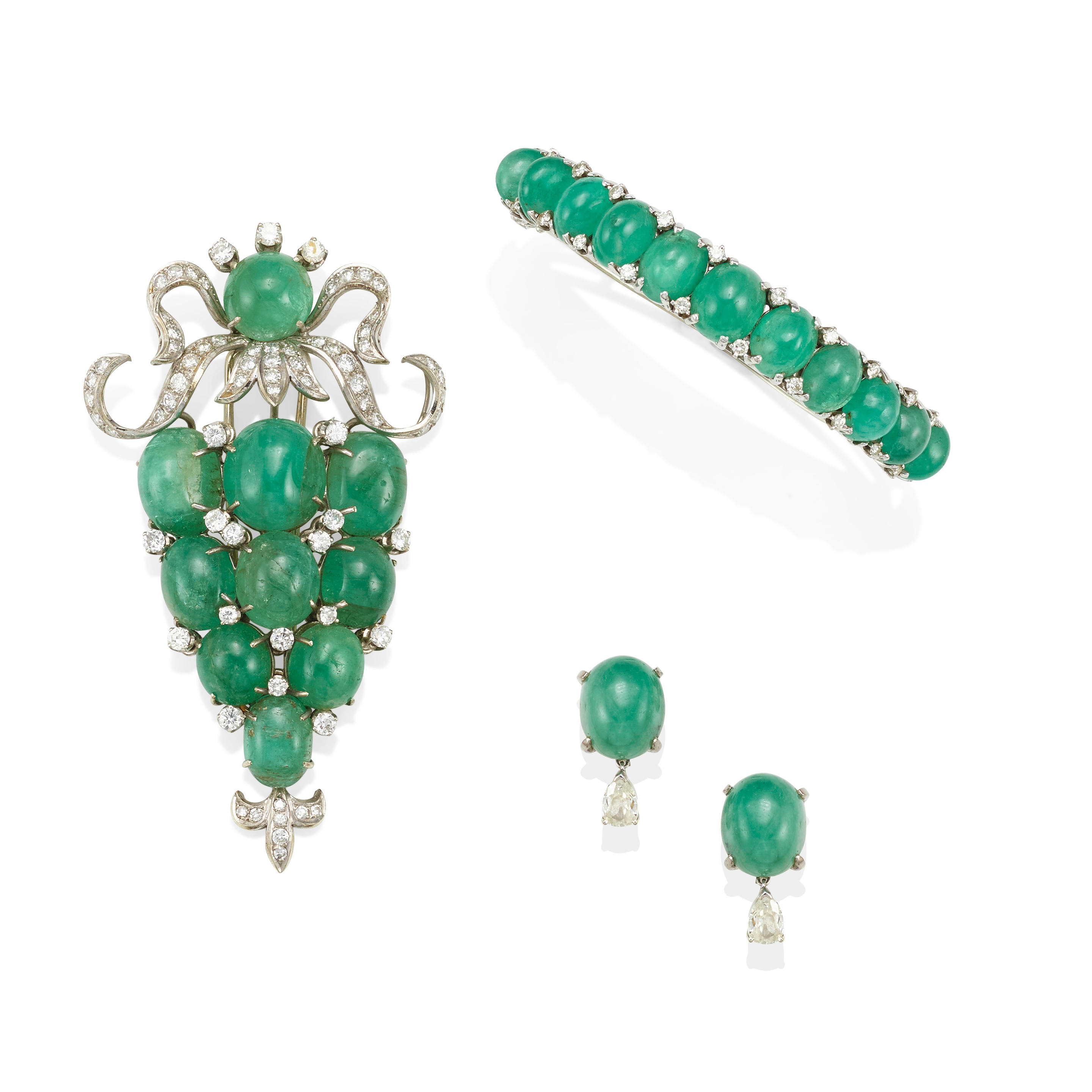 Appraisal: AN K WHITE GOLD EMERALD AND DIAMOND BRACELET CLIP-BROOCH AND