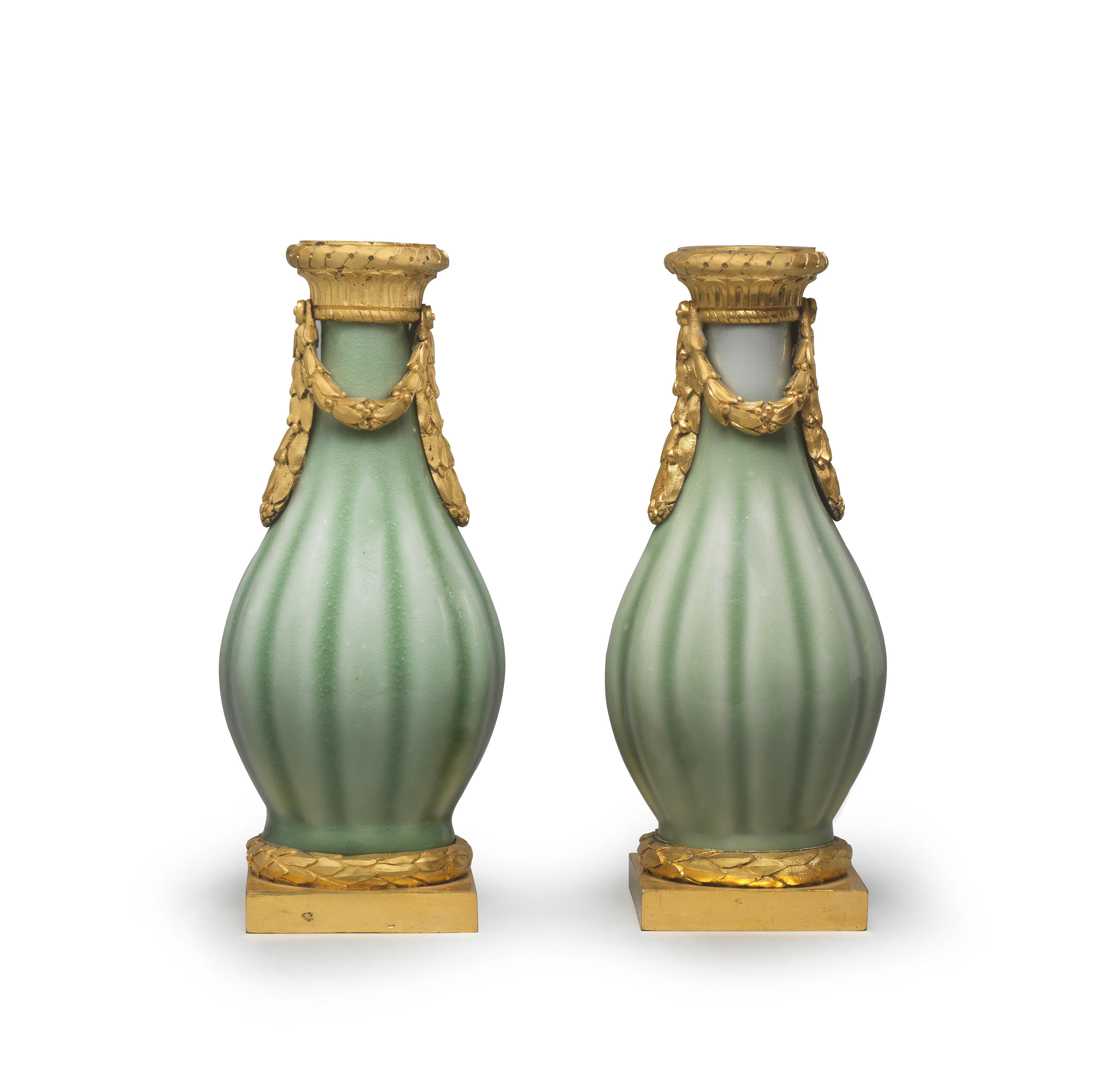 Appraisal: A FINE AND RARE PAIR OF CELADON-GLAZED ORMOLU-MOUNTED VASES The