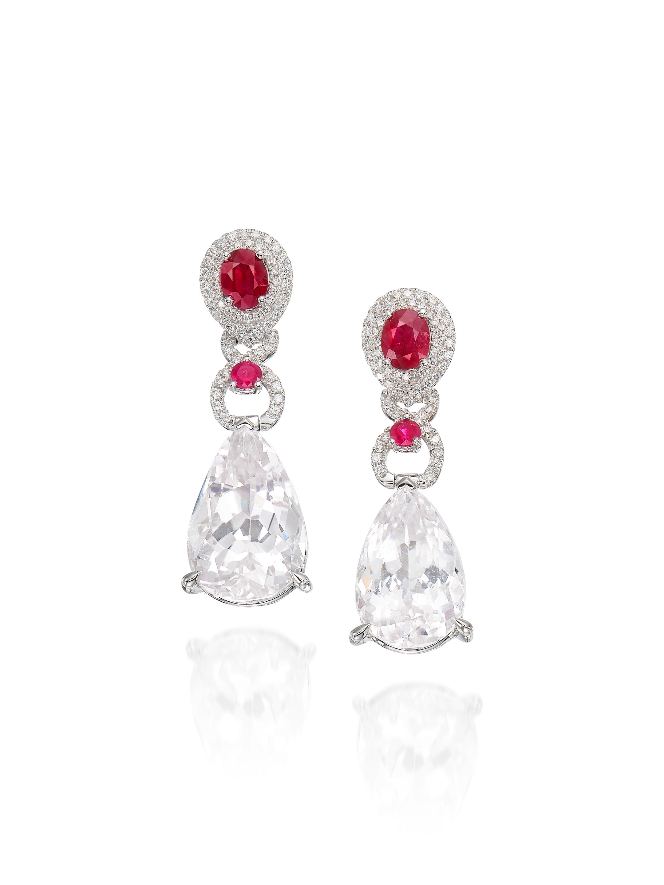 Appraisal: A PAIR OF KUNZITE RUBY AND DIAMOND EARRINGS Each suspending