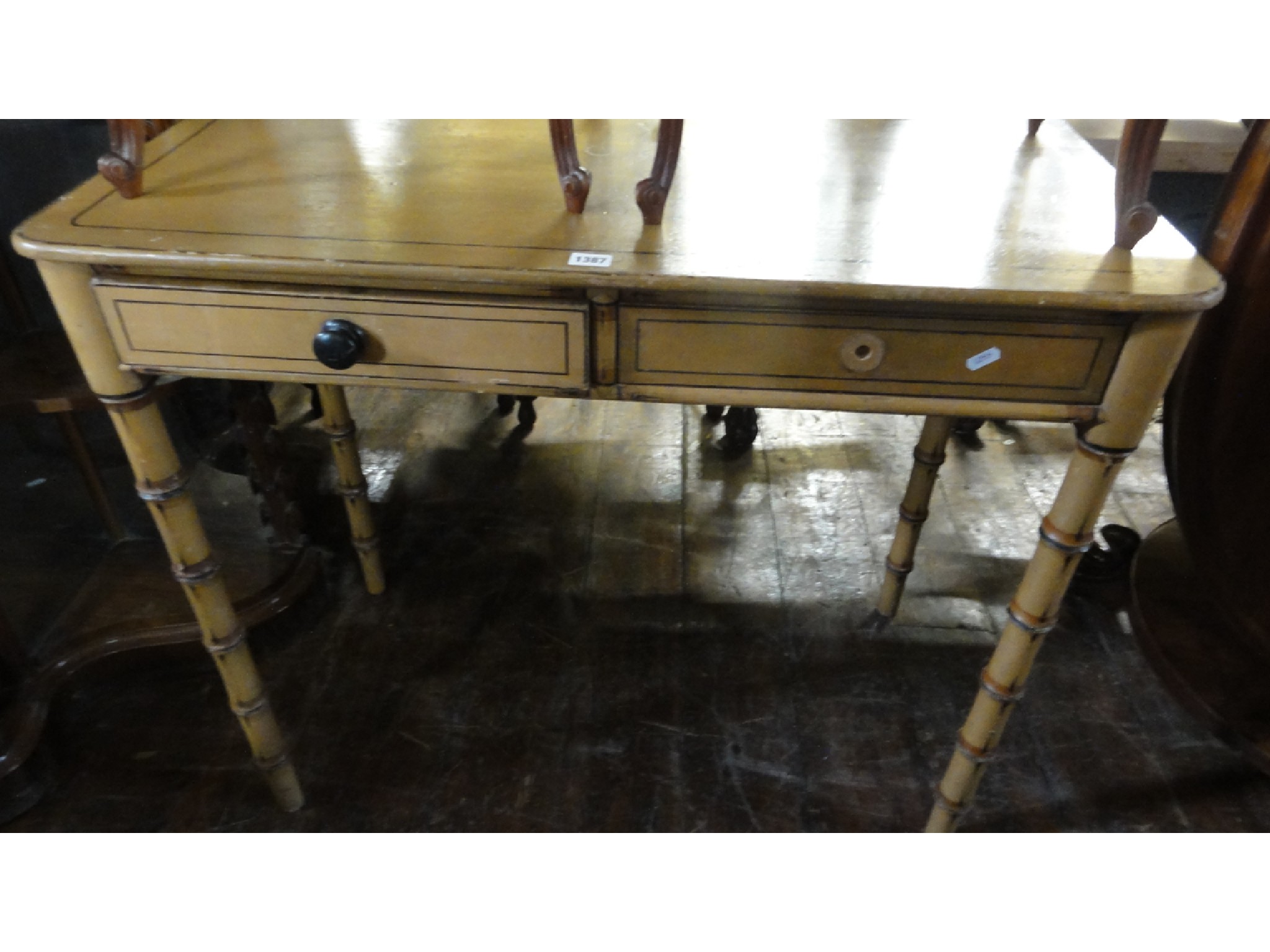 Appraisal: A Regency pine side table raised on shaped and simulated