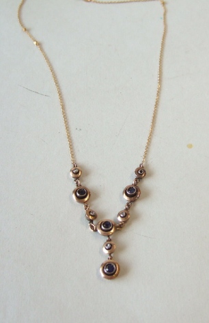 Appraisal: A sapphire and diamond set pendant necklace with a sapphire