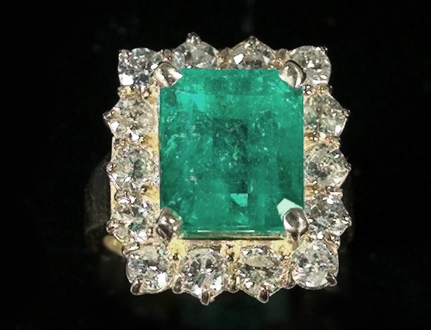 Appraisal: Fourteen-Karat Yellow Gold Emerald and Diamond Dinner Ring featuring a