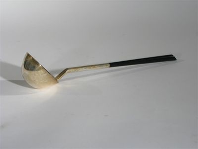 Appraisal: A Modern electroplate and ebonised wood ladle originally designed by