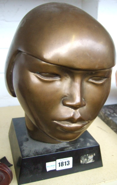 Appraisal: Catharni Stern Bust of an African Girl yellow patinated bronze