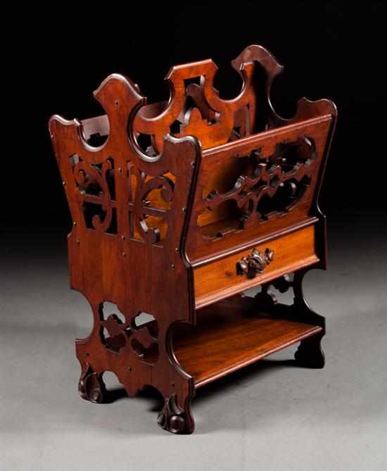 Appraisal: American Rococo Revival carved walnut canterbury circa fretwork carved with