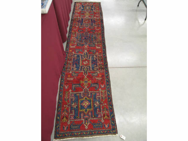 Appraisal: Heriz Persian Handmade Runner geometric medallions red field ' x