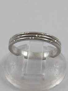 Appraisal: A hallmarked platinum diamond eternity ring Weight grams