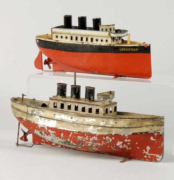 Appraisal: Lot of Tin Boat Wind-Up Toys Description German Working Includes