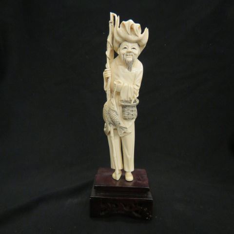 Appraisal: Chinese Carved Ivory Figurine of aHappy Fisherman plus wood base