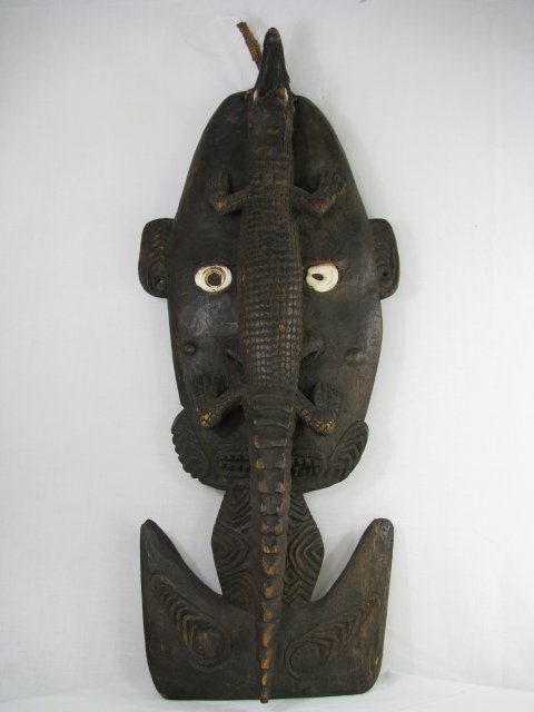 Appraisal: Kandangai carved basket hook accented with a carved crocodile Measures