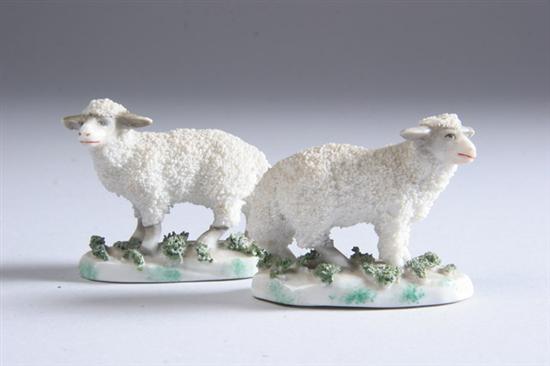 Appraisal: SMALL PAIR ENGLISH PORCELAIN SHEEP th century - in tall