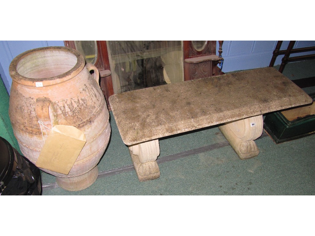 Appraisal: Lot comprising concrete garden seat and a large terracotta urn