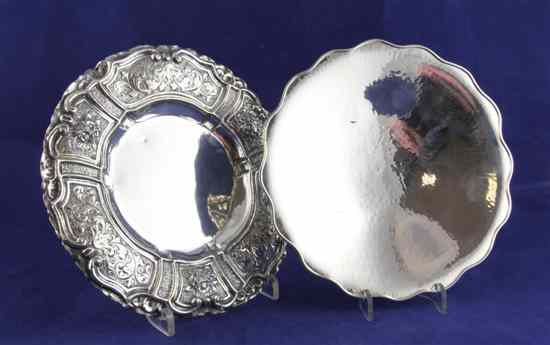 Appraisal: An Italian repousse standard silver dish with foliate scroll rim