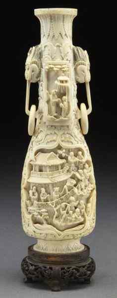 Appraisal: Chinese Qing carved ivory vase International buyers should note that