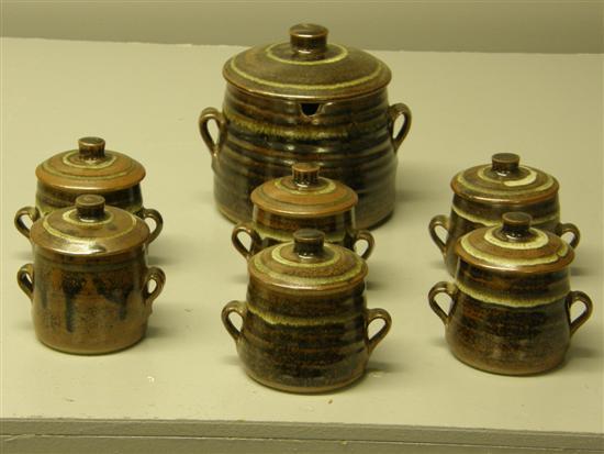 Appraisal: Set of six Bernard Leach soup pots and covers and