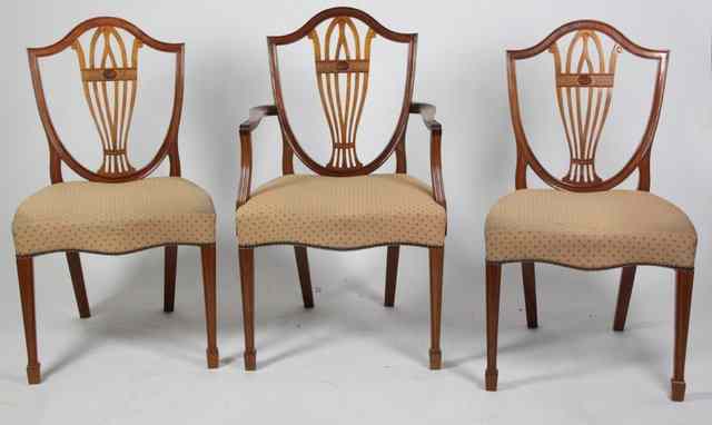 Appraisal: A set of eight reproduction shield back dining chairs comprising