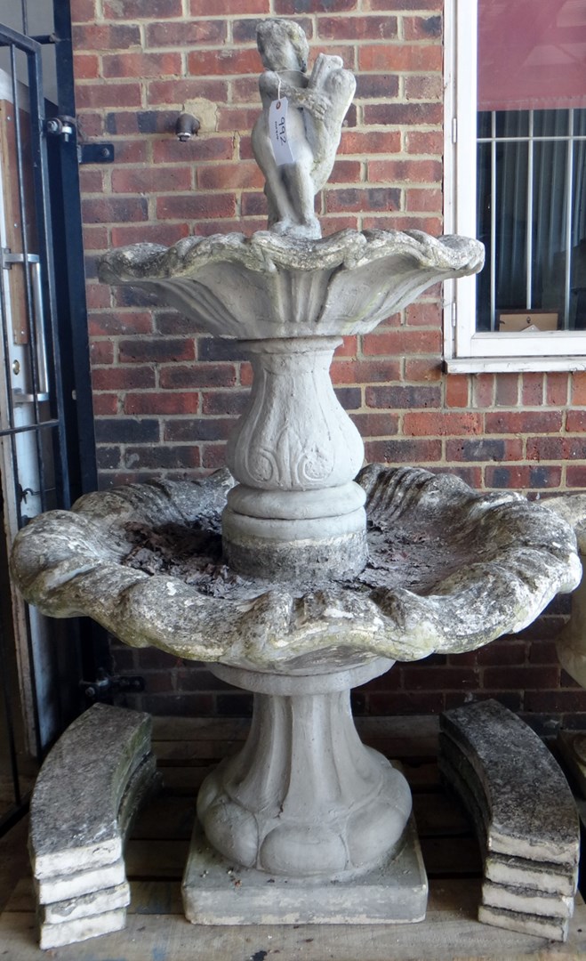 Appraisal: A large reconstituted stone two tier water fountain with boy