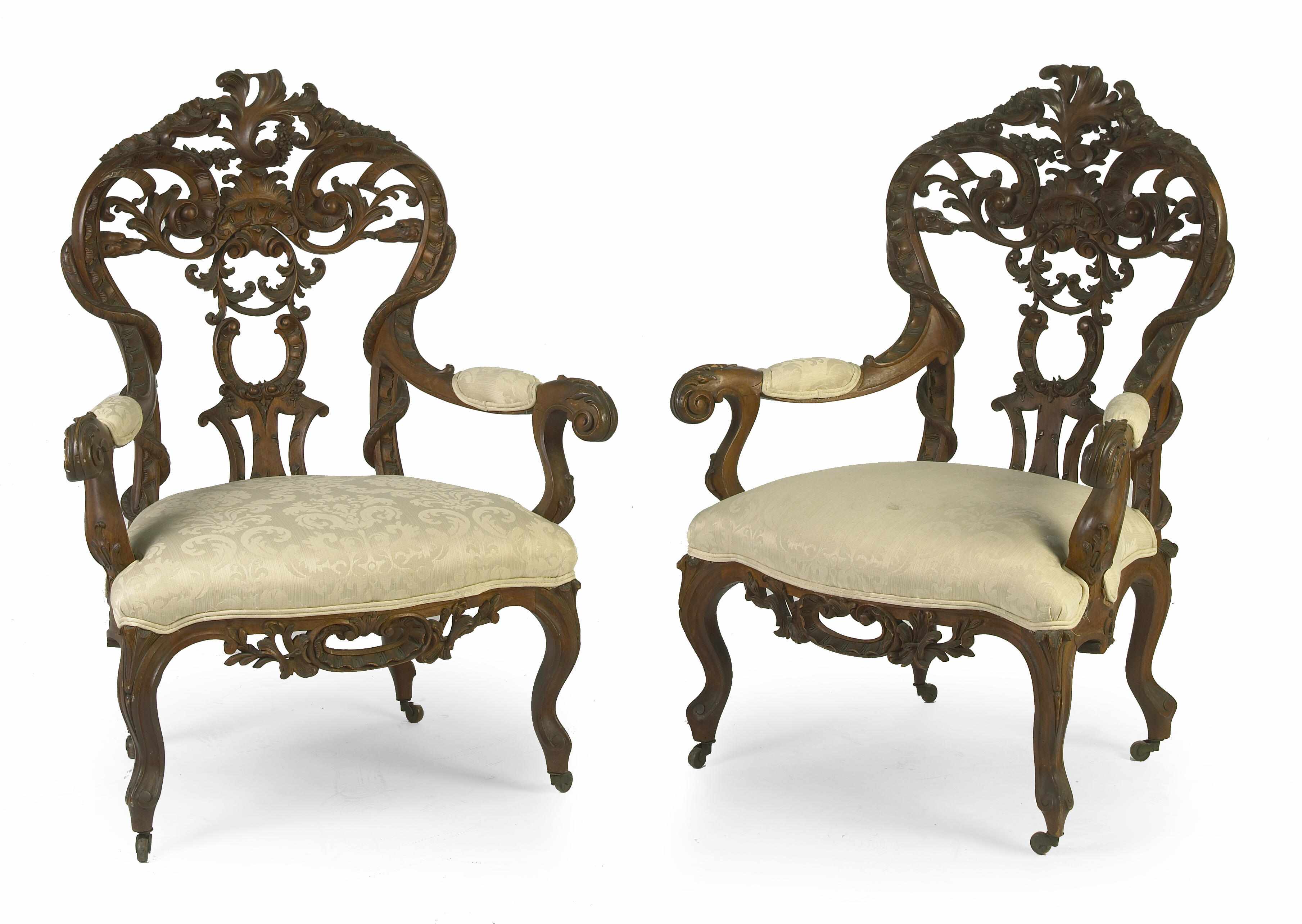 Appraisal: A pair of Louis XV style carved mahogany armchairs height