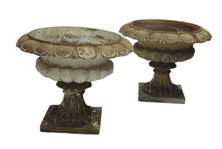 Appraisal: A pair of mid th century terracotta urns the lappet