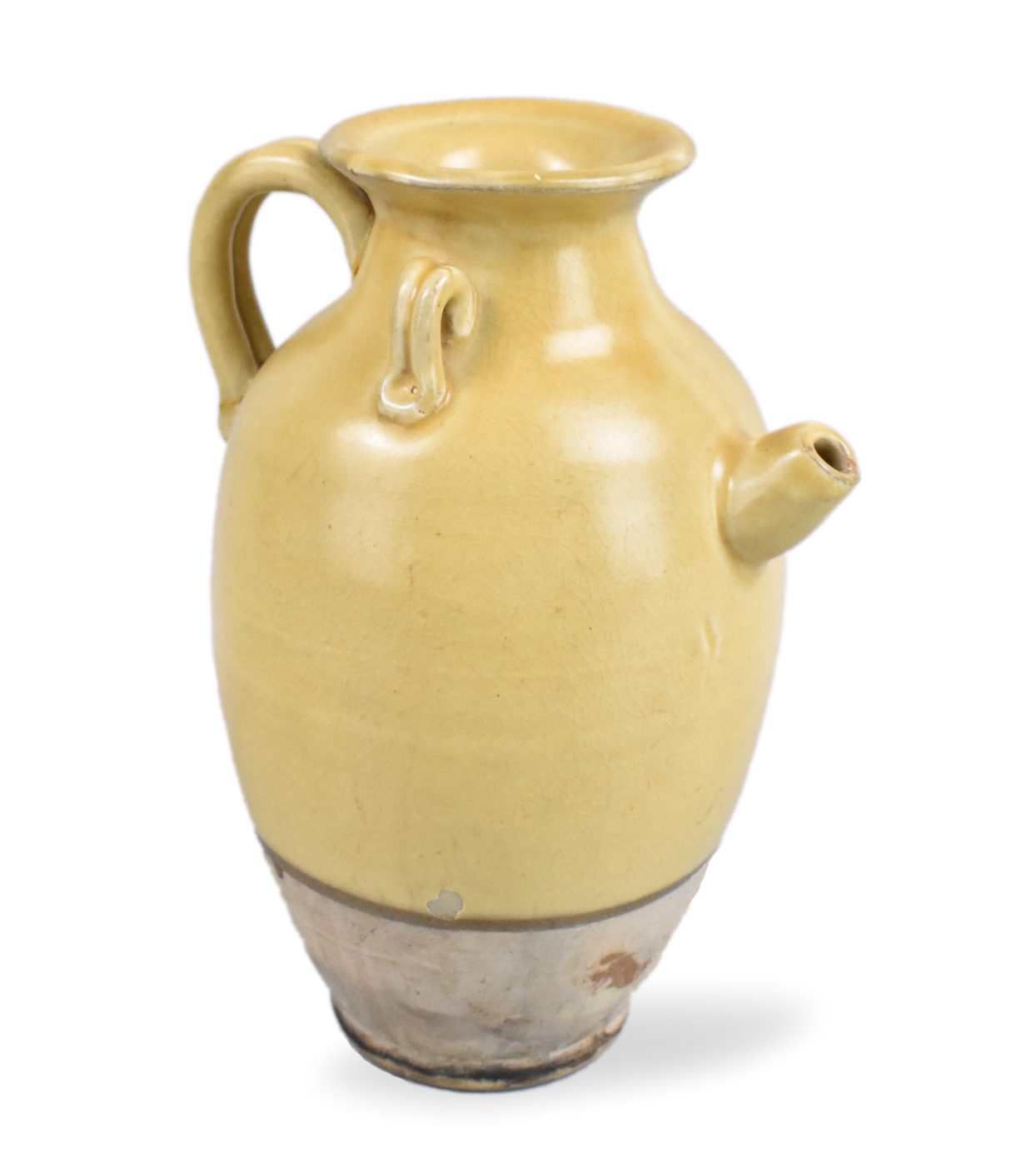 Appraisal: A Chinese celadon glazed ewer dating from the Tang dynasty