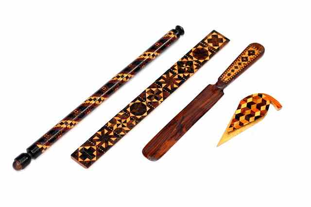 Appraisal: A TUNBRIDGEWARE RULER with geometric panels long a letter opener