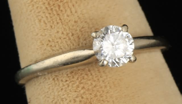 Appraisal: KW gold mm round diamond approximately ct Clarity SI Color