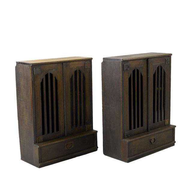 Appraisal: ARTS CRAFTS Pair of low bookcases with drawers and gothic