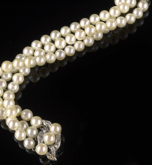 Appraisal: American Fourteen-Karat White Gold Pearl and Diamond Bracelet the triple-strand