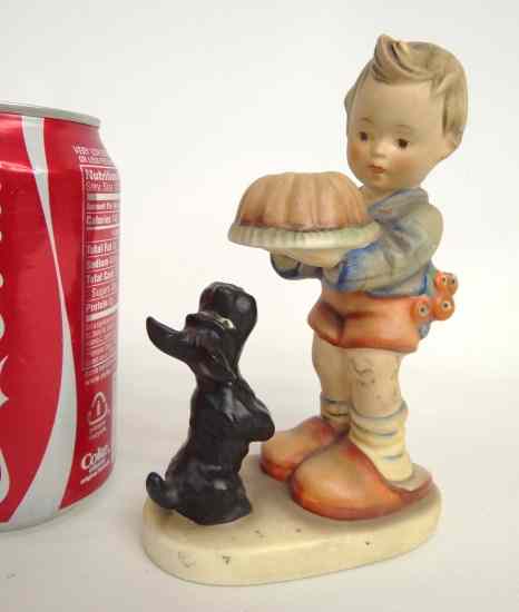 Appraisal: Boy with cake and flowers and dog MJ Hummel figurine