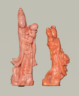 Appraisal: Two Chinese carved coral figures Guanyin holding a child in