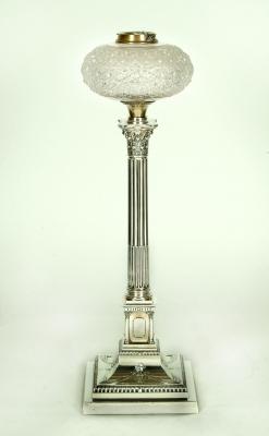 Appraisal: AN EDWARDIAN TABLE LAMP modelled as a stop fluted Corinthian