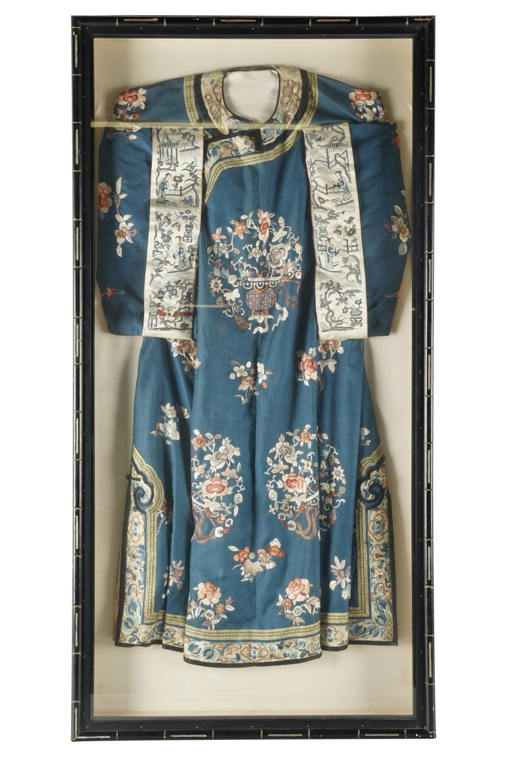 Appraisal: FRAMED CHINESE ROBEblue silk with floral embroidery inches high x