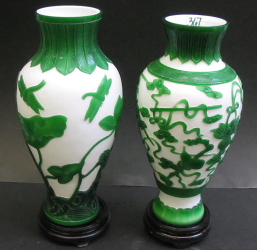 Appraisal: TWO CHINESE PEKING CAMEO GLASS VASES with hard wood stands