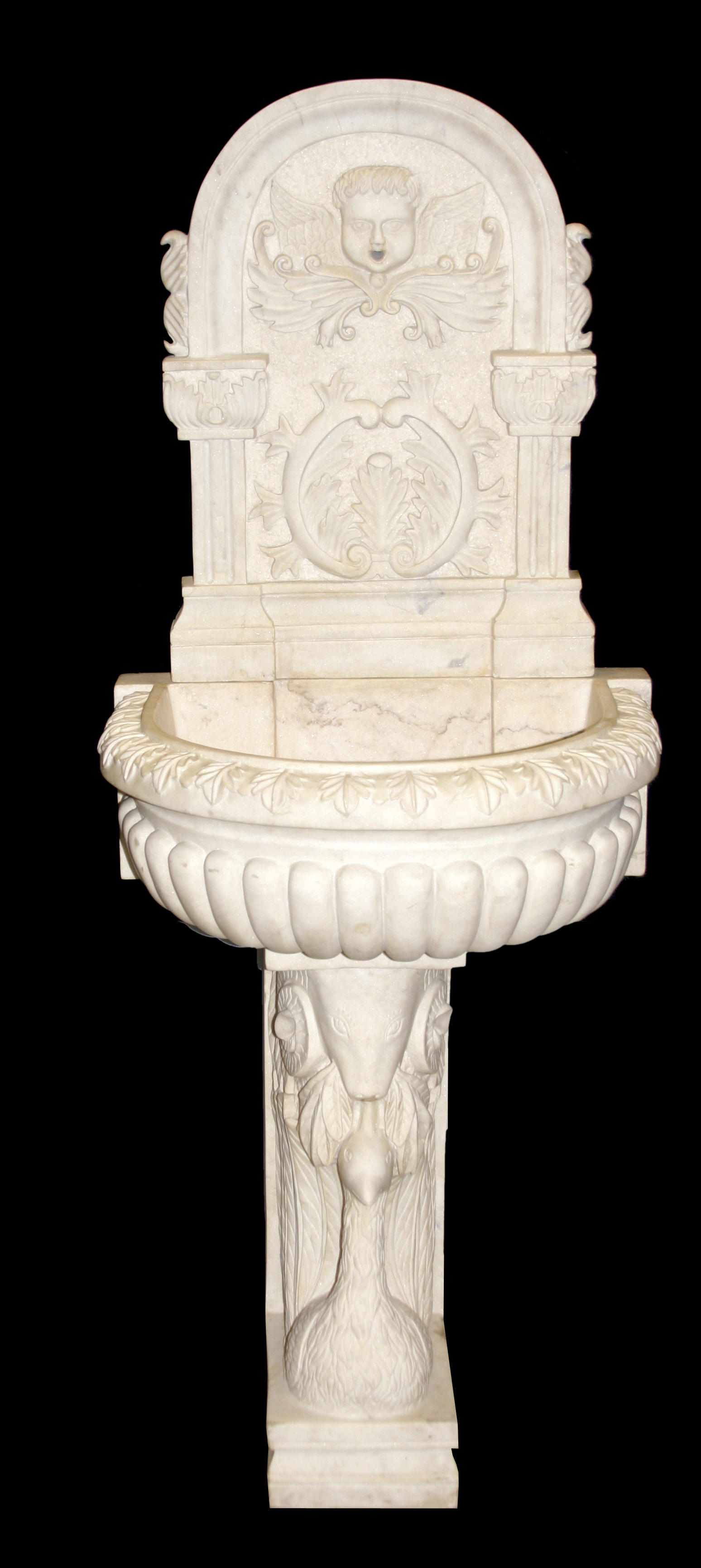 Appraisal: A Baroque style carved marble wall fountain height in width