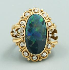 Appraisal: Lady s opal and diamond ring black opal cabochon x