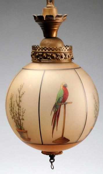 Appraisal: Handel Globe Shaped Parrot Lamp With metal hardware attachments Not