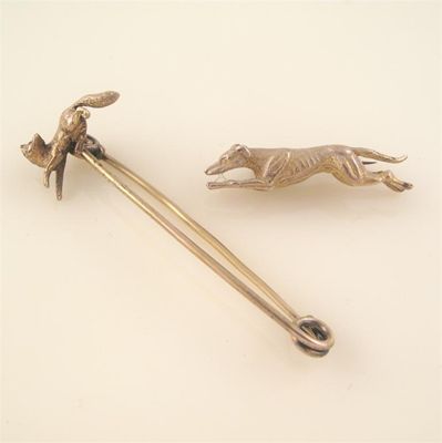 Appraisal: A gold running greyhound brooch mm g and a gold