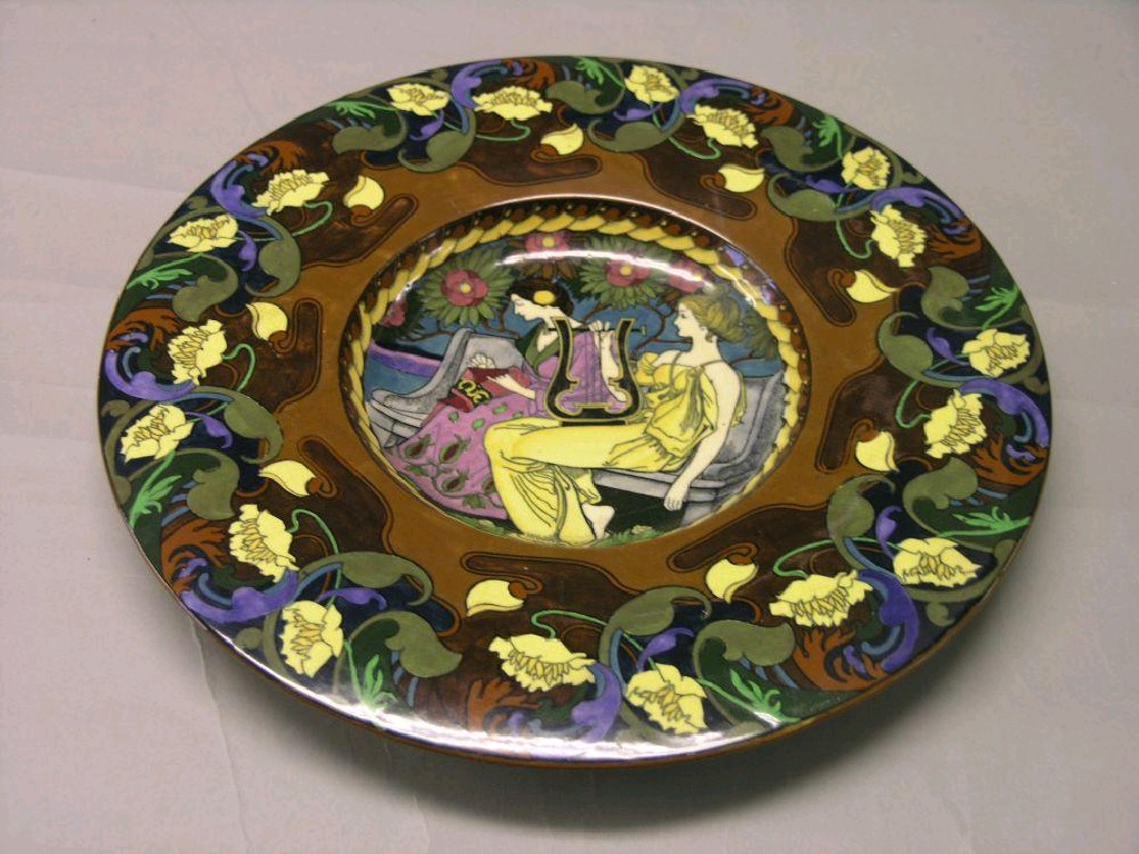 Appraisal: A Wileman Co 'Intarsio' wall plate designed by Frederick Rhead