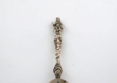 Appraisal: A Victorian Scottish commemorative spoon with a scrolling handle and