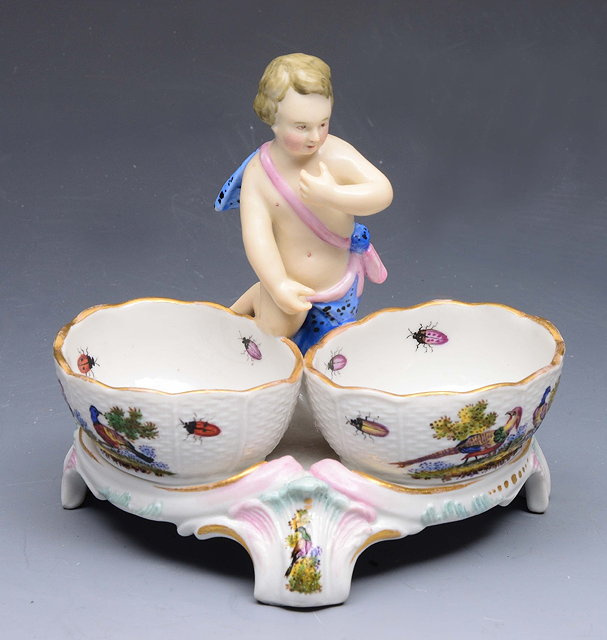 Appraisal: A CONTINENTAL PORCELAIN TABLE SALT in the form of a