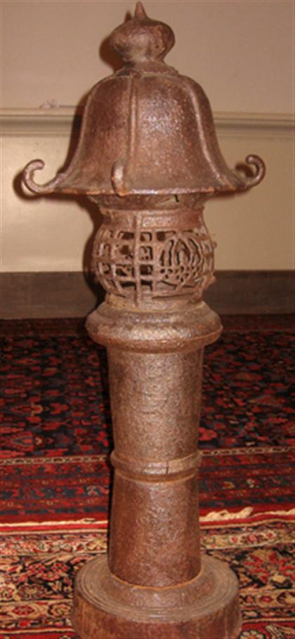 Appraisal: Japanese cast iron garden lantern Of tall pagoda form the