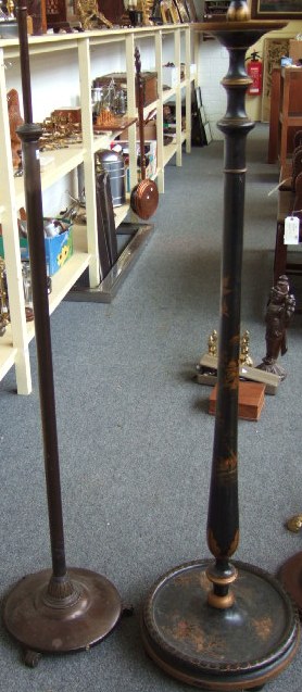 Appraisal: A bronzed metal standard lamp with turned column and circular