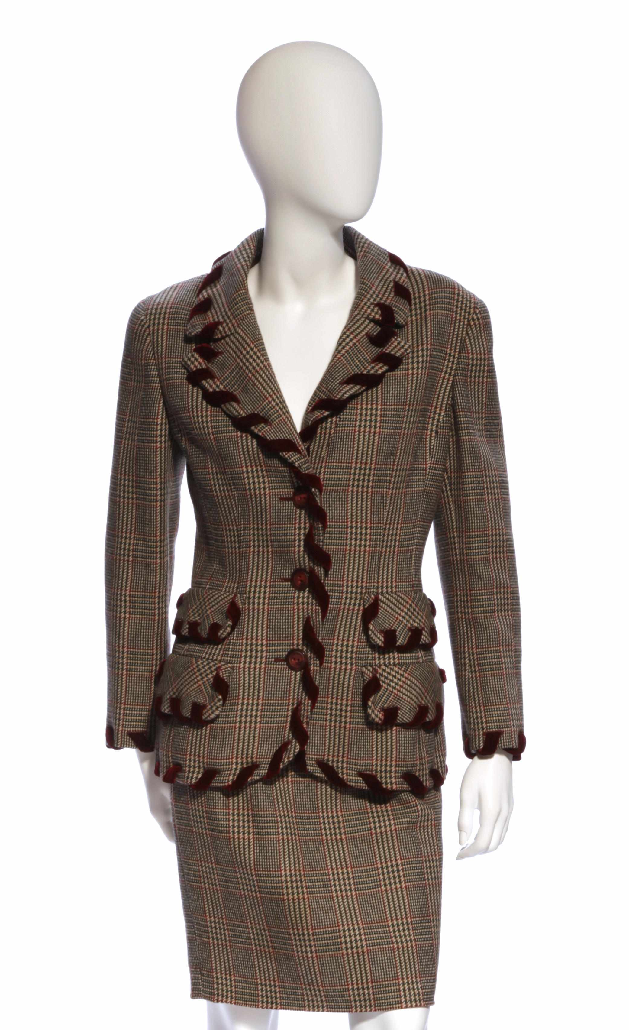 Appraisal: A Valentino burgundy velvet trimmed tan and green plaid jacket