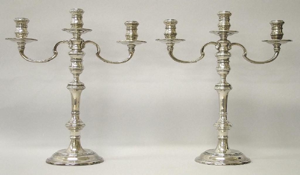 Appraisal: Good pair of three branch candelabra with knopped stems and