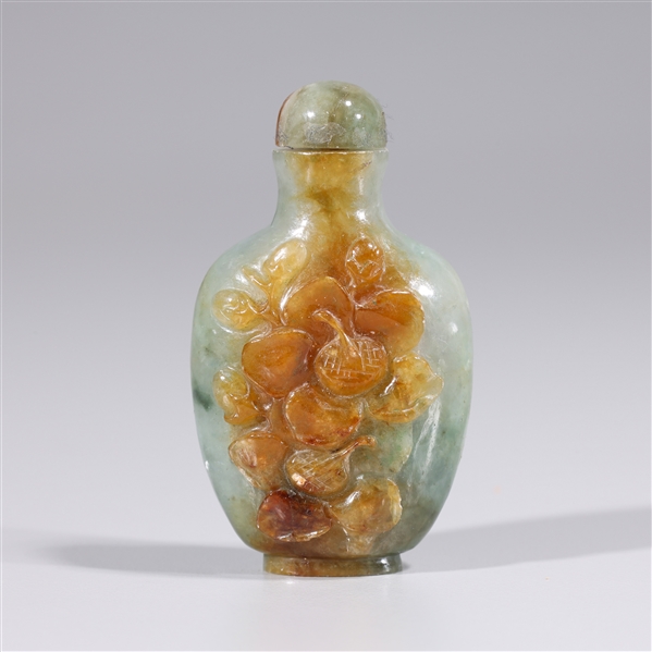 Appraisal: Chinese carved jadeite snuff bottle with matching stopper butterflies and