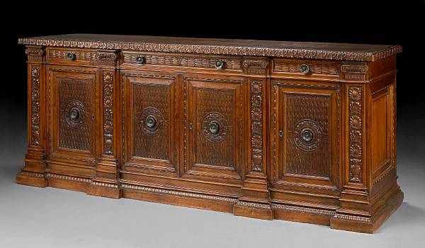 Appraisal: An Italian Baroque style walnut credenza th century The rectangular