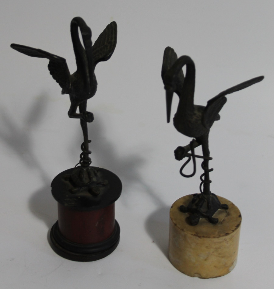 Appraisal: A pair of thC bronze figures of a stork standing